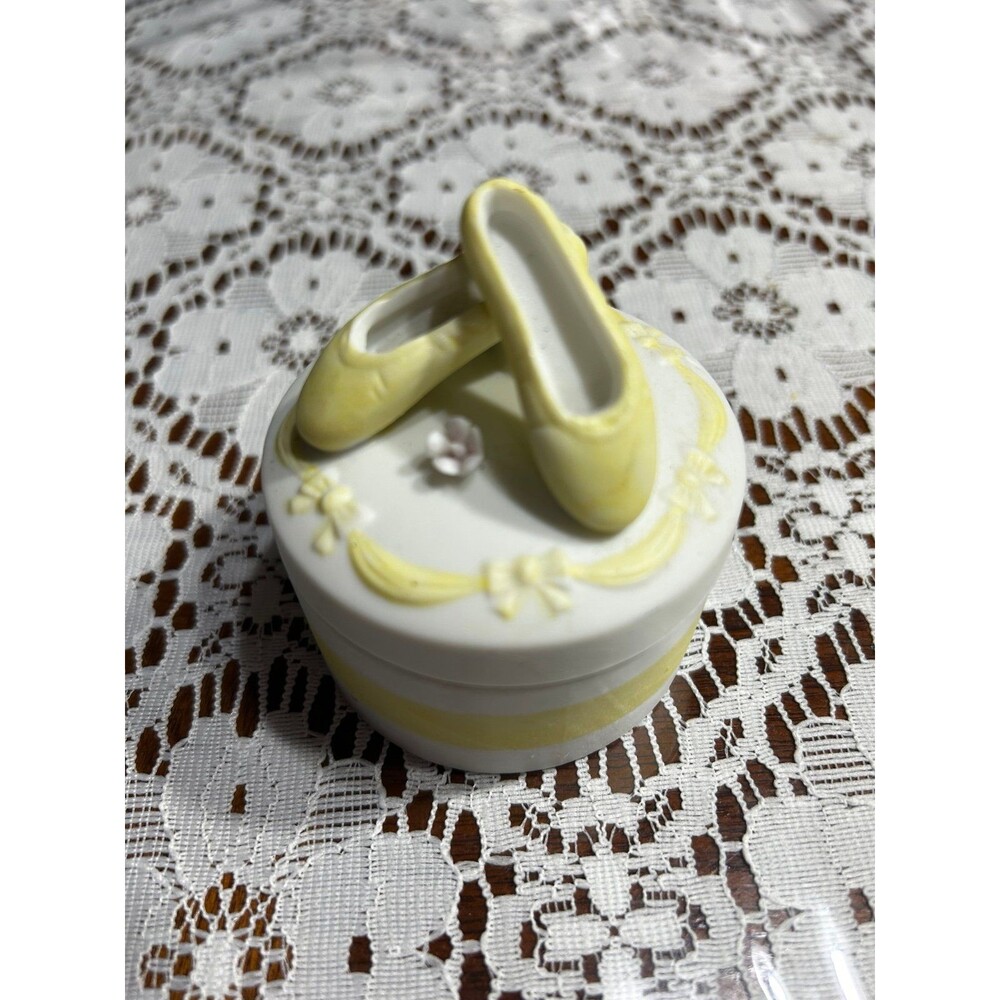 The Lefton hand painted white ceramic basket is a crafted decorative Trinket Box
